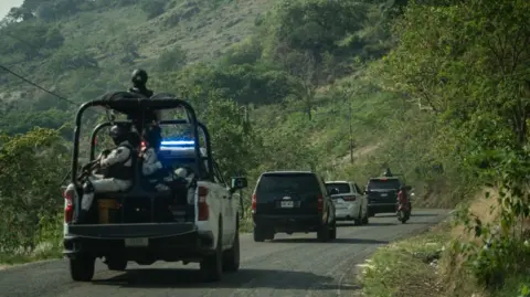 Getty Images Mexican senate candidate Willy Ochoa arrived in the state of Chiapas earlier this month with a security convoy.