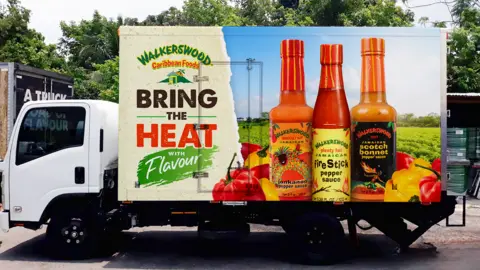Walkerswood A lorry in Jamaica advertising hot sauces from local brand Walkerswood on the side of the vehicle