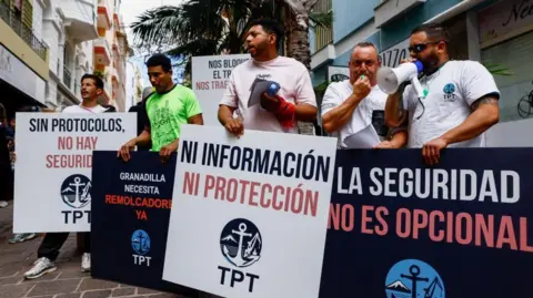 Reuters Protesters in Tenerife campaigning against the arrival of MV Hondius