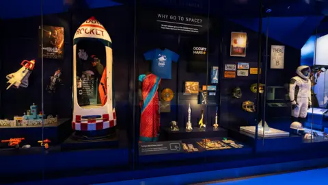 Smithsonian’s National Air and Space Museum Nandini Harinath's sari as displayed in the gallery at Smithsonian museum