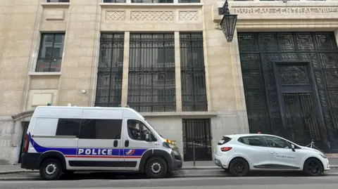 Reuters Prosecutors have arrested three people following an attack on Bank of America’s offices in Paris.