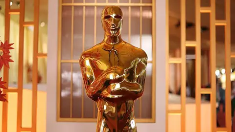 AFP via Getty Images An Oscar statue is seen ahead of the 98th Academy Awards at the Dolby Theatre in Hollywood, California, on 14 March 2026.