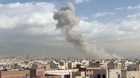 Reuters Smoke rises above Tehran after strike
