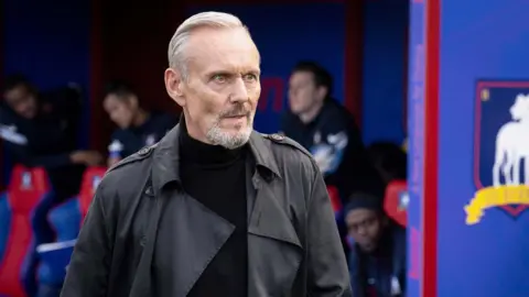 Alamy Anthony Head in a scene from Apple TV+ series : Ted Lasso - season 3 (2024).