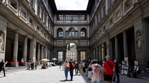 Wirestock A stunning view of the historic Uffizi Palace in Florence, Italy