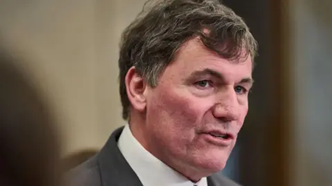 Getty Images An image of Dominic LeBlanc mid speech. He is wearing a suit and has black and gray short hair.