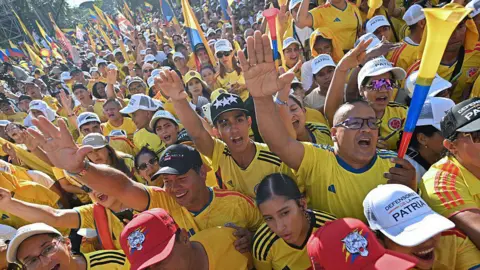 AFP via Getty Images Supporters of Colombia's presidential candidate Abelardo de la Espriella of the Salvadores de la Patria movement attend his closing campaign rally in Buga, Valle del Cauca department, Colombia on June 14, 2026.