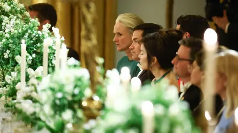 Getty Images US Secretary of State Marco Rubio listens to US President Donald Trump speak during a State Dinner in honor of Britain's King Charles III and Queen Camilla in the East Room of the White House in Washington, DC, on April 28, 2026. (Photo by Henry Nicholls / AFP via Getty Images)
