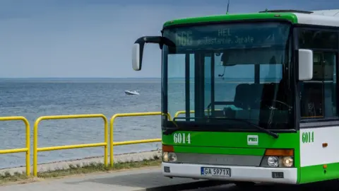 PKS GDYNIA/Reuters A local bus numbered 666, heading to Polish seaside resort Hel, is parked on the roadside in Rewa, Poland.