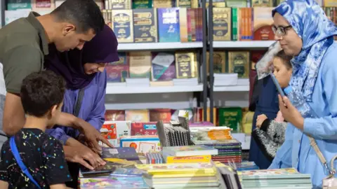 Jalal Morchidi/EPA People visit an international book fair in Rabat, Morocco - Saturday 11 May 2024