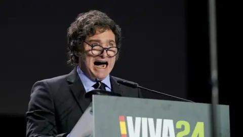 Reuters Argentina's President Javier Milei speaks during a rally organised by the Spanish far-right Vox party