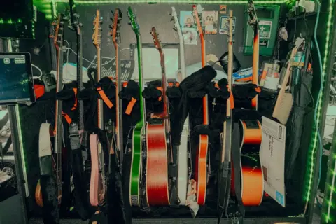 Blair Brown An array of guitars waiting for their moment in the spotlight