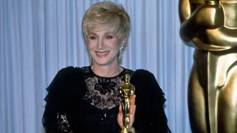 Getty Images Olympia Dukakis with her best supporting actress Oscar statuette at the 60th Academy Awards at the Shrine Auditorium circa 1988 in Los Angeles, California.
