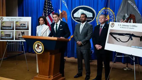 Roll Call via Getty Images From left, Jeanine Pirro, the U.S. attorney for Washington, D.C., Acting Attorney General Todd Blanche, FBI Director Kash Patel, and Darren B. Cox, deputy assistant director of the FBI Criminal Investigative Division, conduct a news conference at the Department of Justice about Cole Tomas Allen, the suspect in the White House Correspondents' Association dinner shooting, on Monday, April 27, 2026.