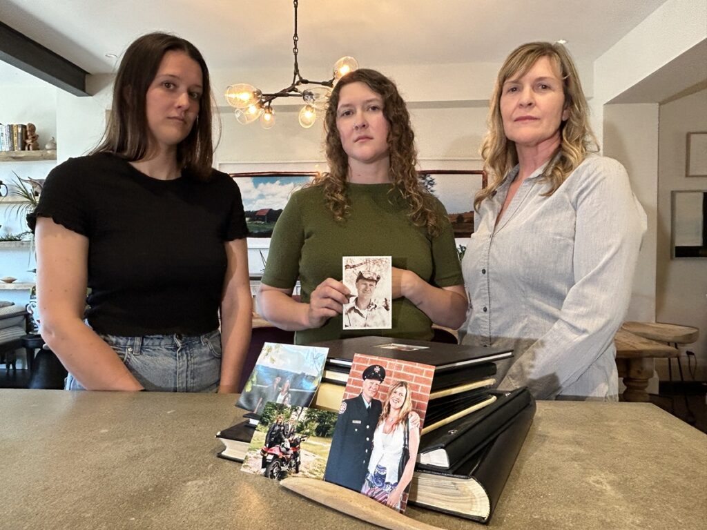 Brenna Parker, Ryla Parker and Zilla Parker (left to right) are seen with photos of Dominic Parker.