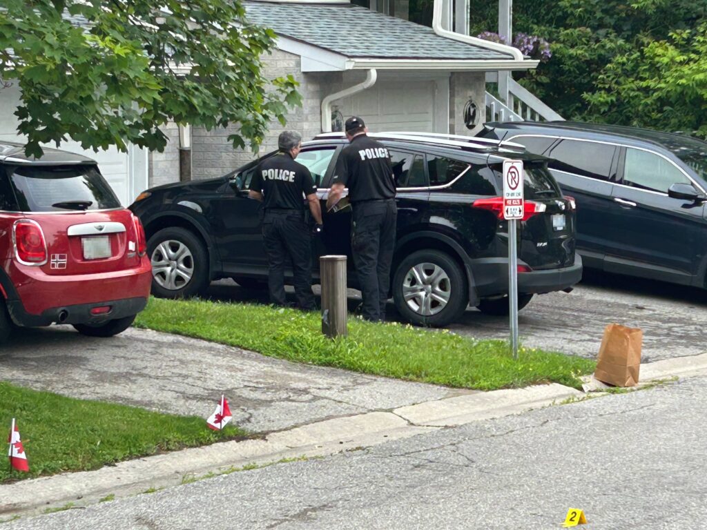 Police investigate a shooting near Wellington Street and McDonald Drive in Aurora on June 26, 2026
