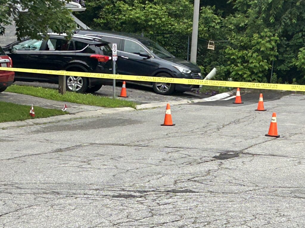 Police investigate a shooting near Wellington Street and McDonald Drive in Aurora on June 26, 2026