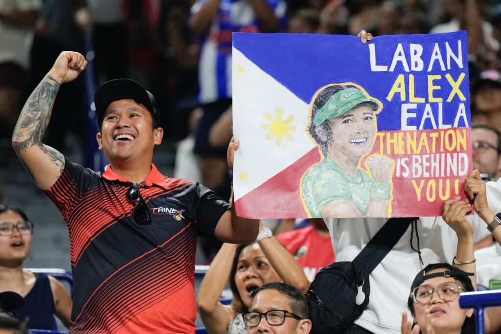 Fans hold up a banner as Philippines' Alexandra Eala takes on United States' Alycia Parks during National Bank Open action in Toronto on Wednesday, August 5, 2026