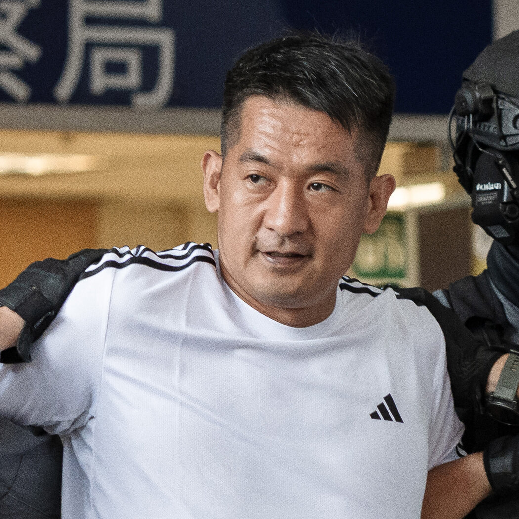 佘智江週三在泰國被警方押解，隨後被引渡回中國。