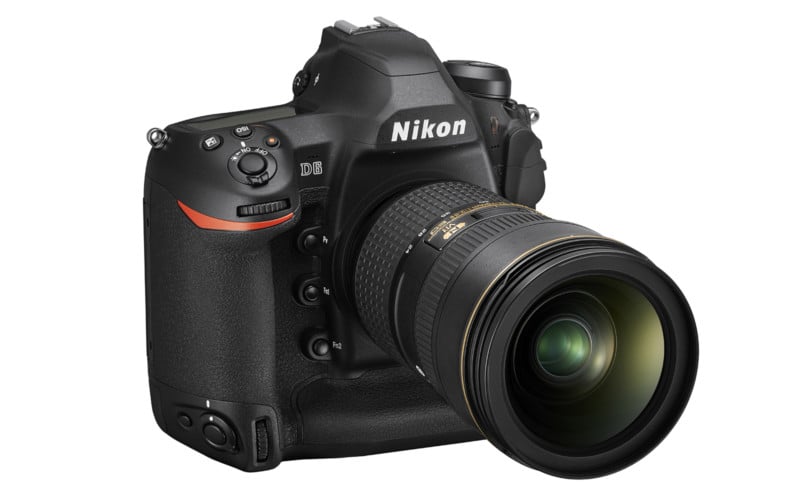 A black Nikon D6 DSLR camera with a zoom lens attached, viewed from the front-right angle against a white background.