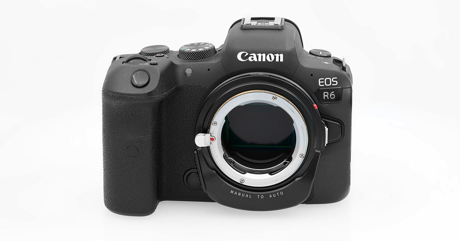 A Canon EOS R6 mirrorless camera body with a lens adapter attached, shown against a white background.