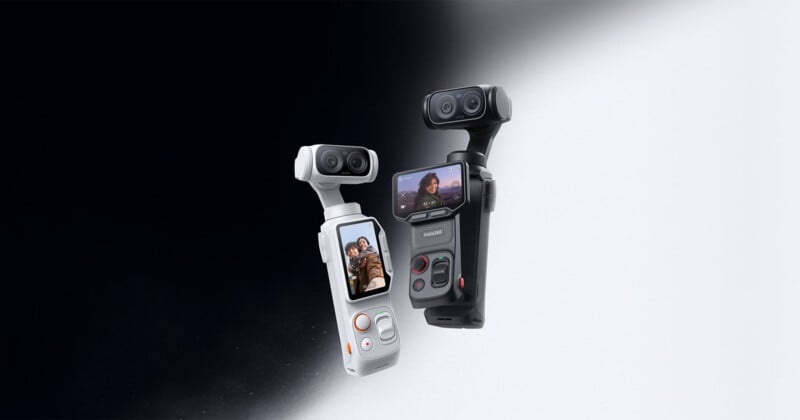 Two handheld camera gimbals, one white and one black, each with dual lenses and a small built-in screen displaying people. The devices are shown against a black-to-white gradient background.