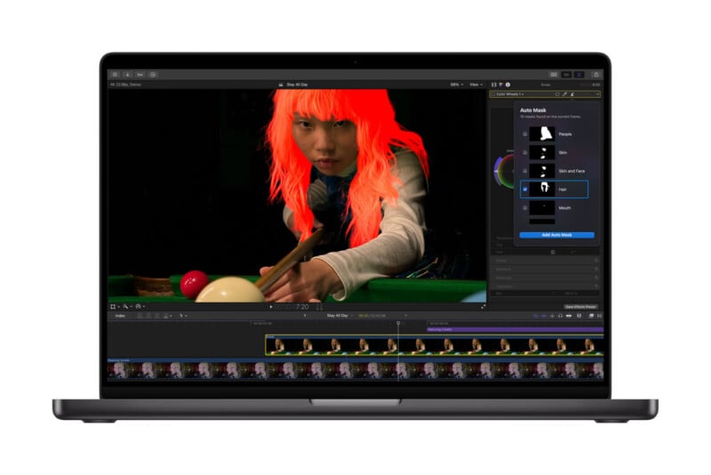 A laptop screen displays video editing software with a scene of a person playing pool; their hair is highlighted in bright red with tools visible on the right for selecting mask options.