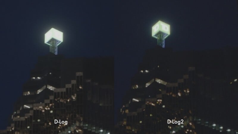 Side-by-side comparison of a city building at night with a glowing structure on top; left image labeled "D-Log" appears darker, right image labeled "D-Log2" is brighter with more visible details.