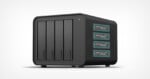 A black network attached storage (NAS) device with four vertical drive bays on the left and four panels with digital displays on the right, set against a plain white background.