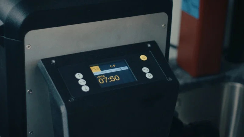 A close-up of a digital control panel on a piece of industrial equipment, displaying a timer set to 07:50 and the text "E-6" and "P3.3" on its screen.