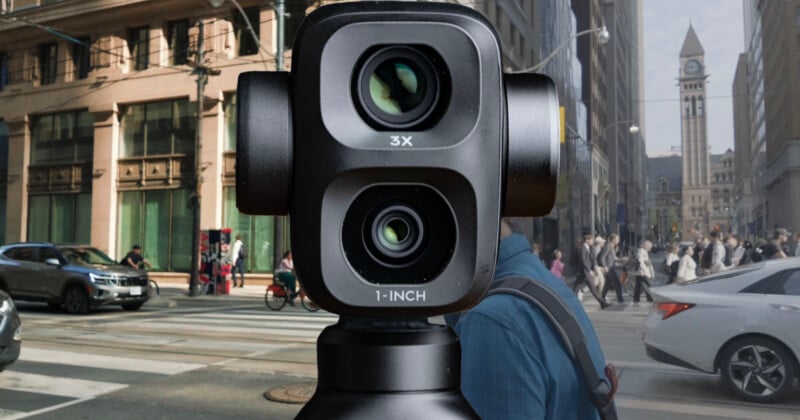 A close-up of a dual-lens camera labeled 