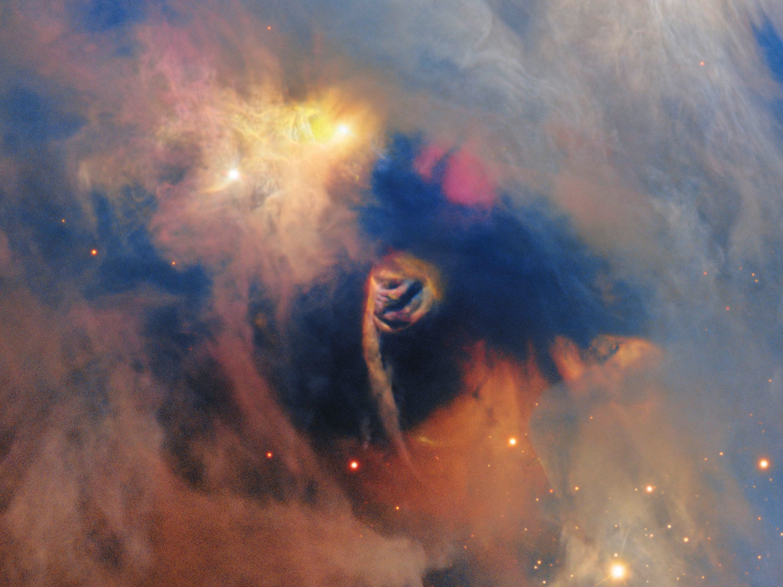 Vivid nebula with swirling clouds in orange, blue, yellow, and pink hues, illuminated by bright stars, creating a colorful cosmic landscape in deep space.