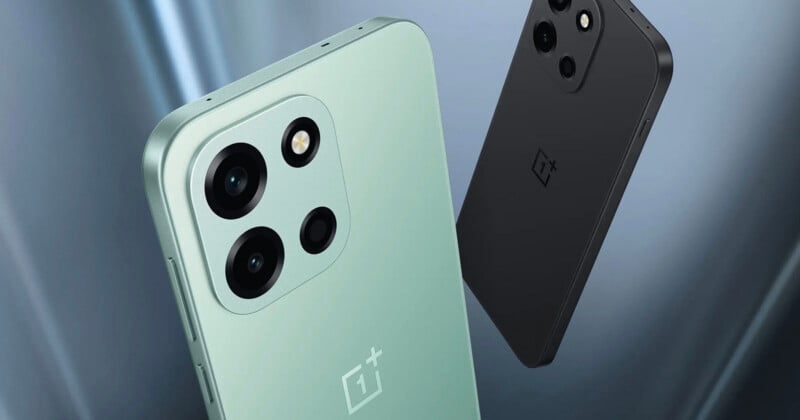 mint green smartphone and black smartphone on a gray background