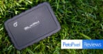 A black Glyph Production Technologies external hard drive rests on green grass, with a PetaPixel Reviews logo in the corner.