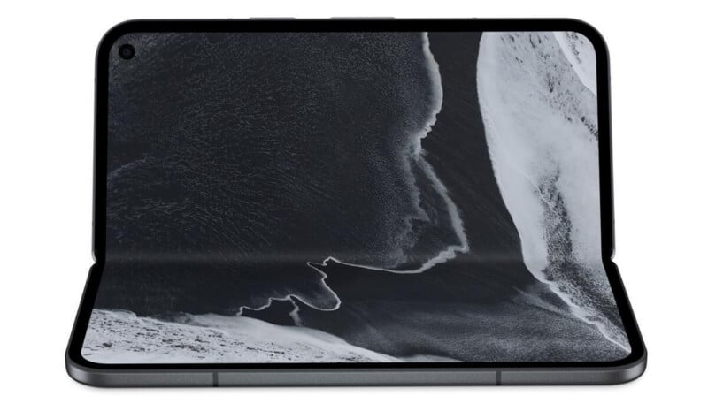 A foldable smartphone is shown partially open, displaying an abstract black and white image of waves on its flexible screen.