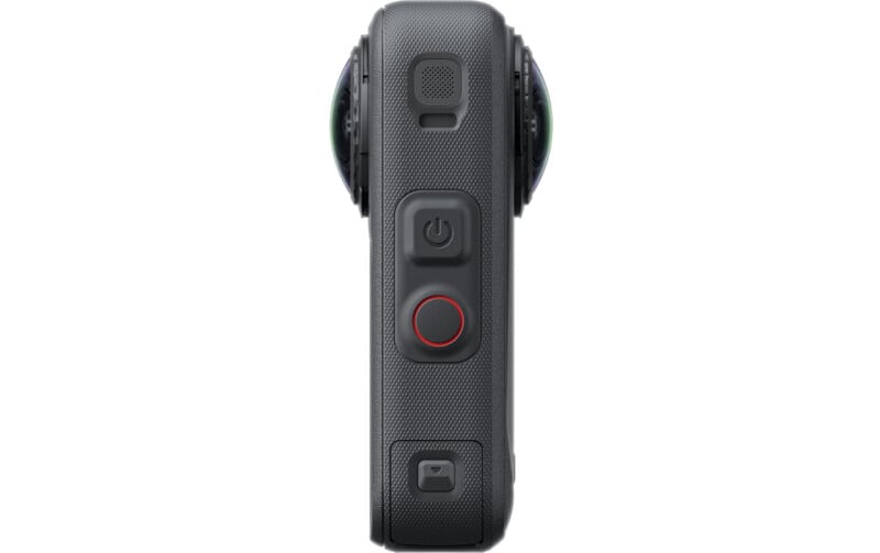 A vertical, black 360-degree camera with two lenses, a power button, a record button, and a speaker grille on its side.