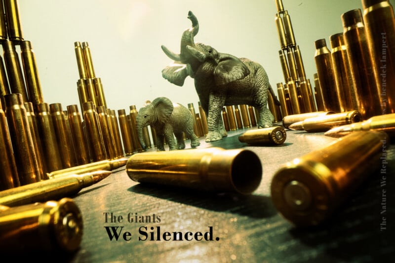 Two toy elephants stand amidst a landscape of upright brass bullet casings, with the text "The Giants We Silenced." below.