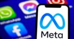 A smartphone screen displays the blue Meta logo and company name, with blurred app icons for Facebook, WhatsApp, and Messenger in the background.