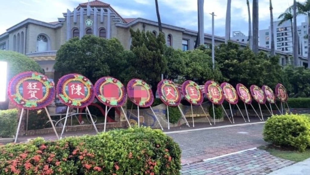 The wreaths were lined up outside the school where the “distressed” teacher was starting a new job. Photo: social media