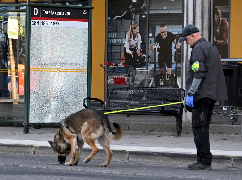 Police at the scene after a shooting incident in southern Stockholm’s Farsta in 2023. Photo: AP
