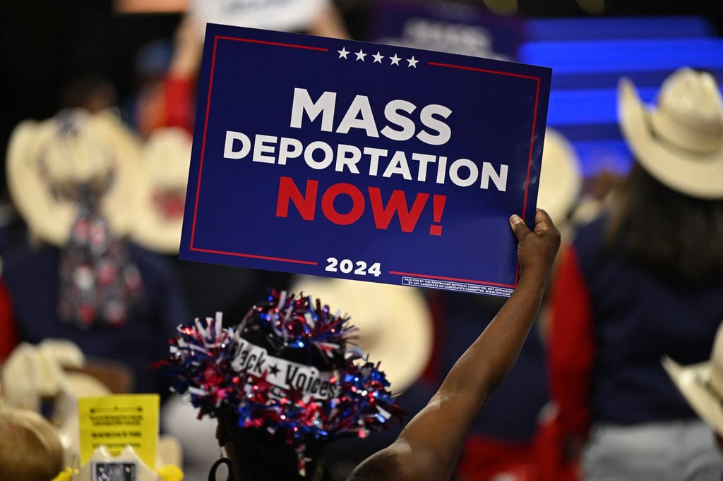 An attendee bears a sign at the Republican National Convention in Milwaukee, Wisconsin, on July 17, 2024. Photo: AFP