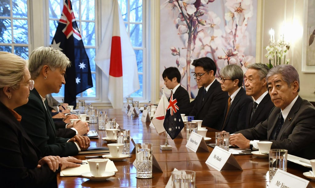 Japanese Foreign Minister Takeshi Iwaya (right) and his Australian counterpart Penny Wong hold talks in Washington on Sunday. Photo: Kyodo