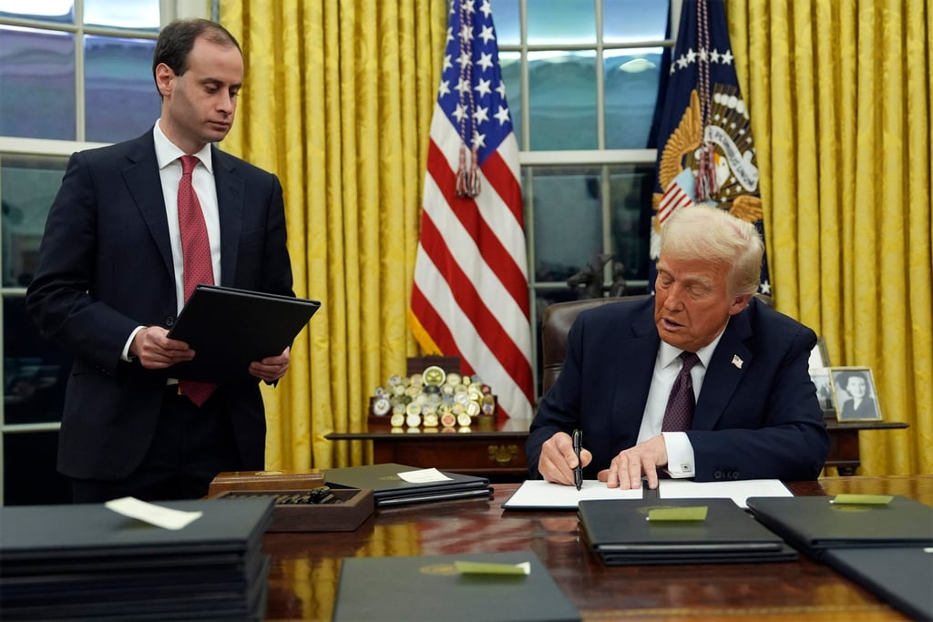 President Donald Trump signs an executive order on TikTok in the Oval Office of the White House on January 20, 2025, in Washington. Photo: AP