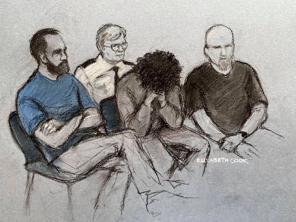 File court artist drawing of Axel Rudakubana, centre, covering his face as he appeared in the dock at Liverpool Crown Court, England on August 1, 2024. Photo: AP