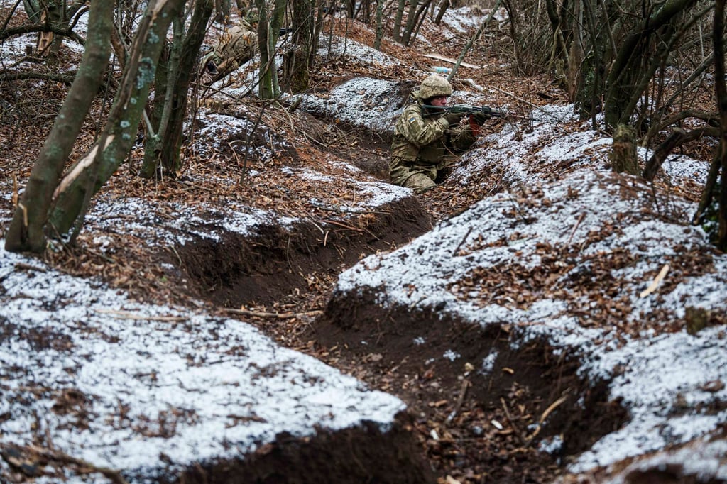 A Ukrainian serviceman trains near the front line in Donetsk region, Ukraine. Photo: AP