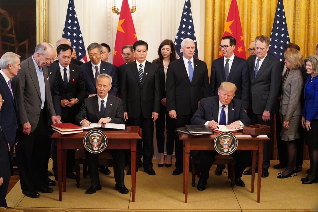 US President Donald Trump and former Chinese vice-premier Liu He sign the phase-one trade deal at the White House in 2020. A review of the deal during Trump’s second term may put pressure on China to fulfil its missed requirements. Photo: Xinhua