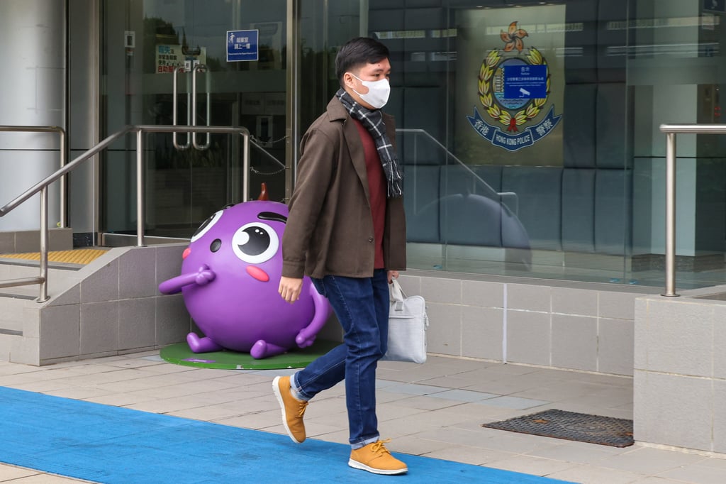 Adam Yuen, research executive of Hong Kong Public Opinion Research Institute, leaves Sha Tin Police Station. Photo: Jelly Tse