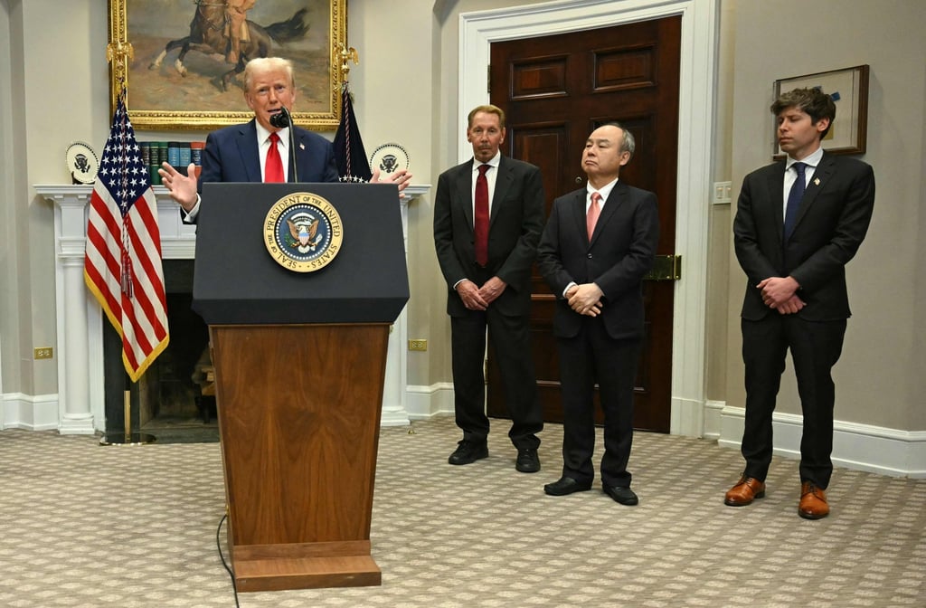 US President Donald Trump speaks in the Roosevelt Room flanked by (left to right) Oracle executive chairman Larry Ellison, SoftBank chairman and CEO Masayoshi Son, and OpenAI co-founder and CEO Sam Altman at the White House on January 21. Photo: AFP