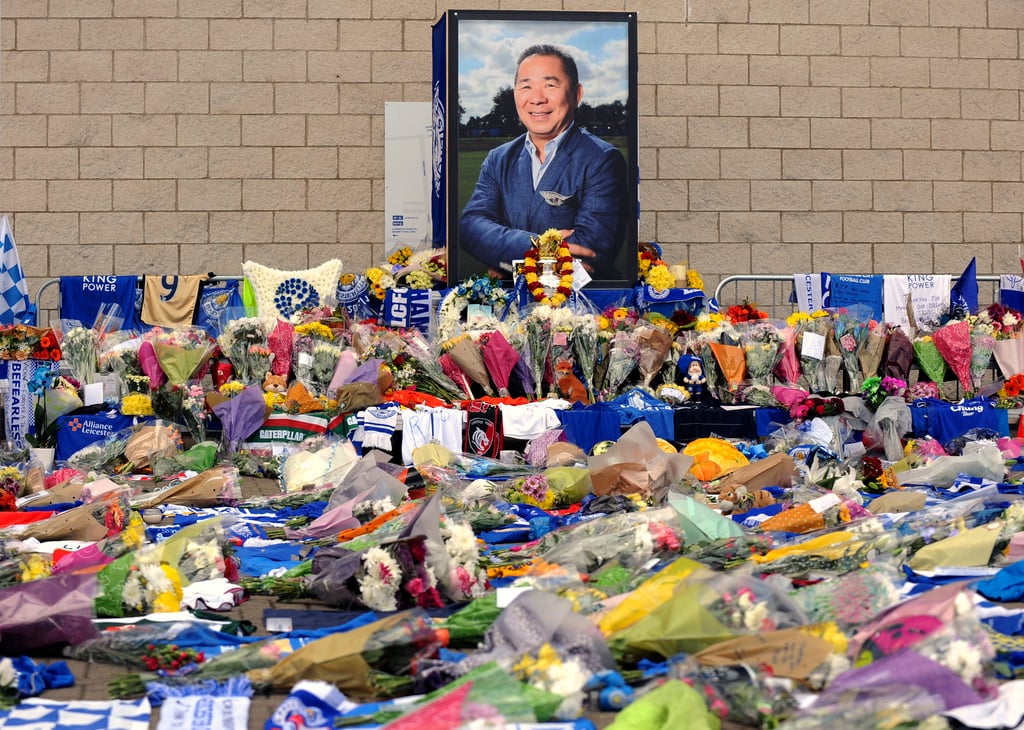 Tributes at a memorial under a portrait of former Leicester owner Vichai Srivaddhanaprabha. Photo: AP