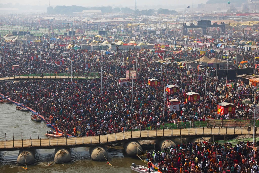 Pilgrims gather to take a holy dip on Wednesday. Photo: AFP